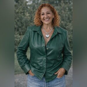 Heart necklace is just plain silver, hand made